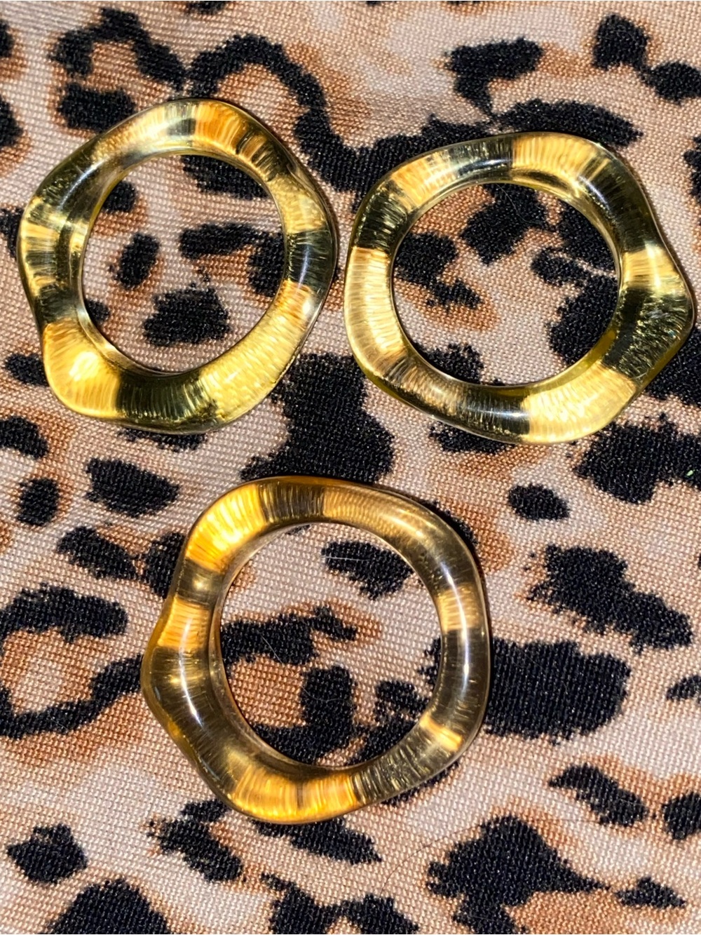 2 yellow and 1 orange acrylic rings